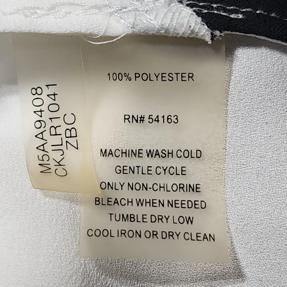 Calvin Klein Black, White, and Snakeskin Color Block V-neck Sleeveless Top